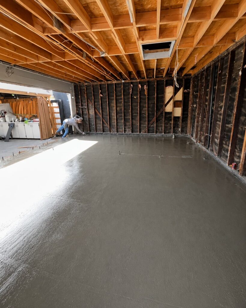 Garage conversion framing and concrete work during South Gate ADU construction